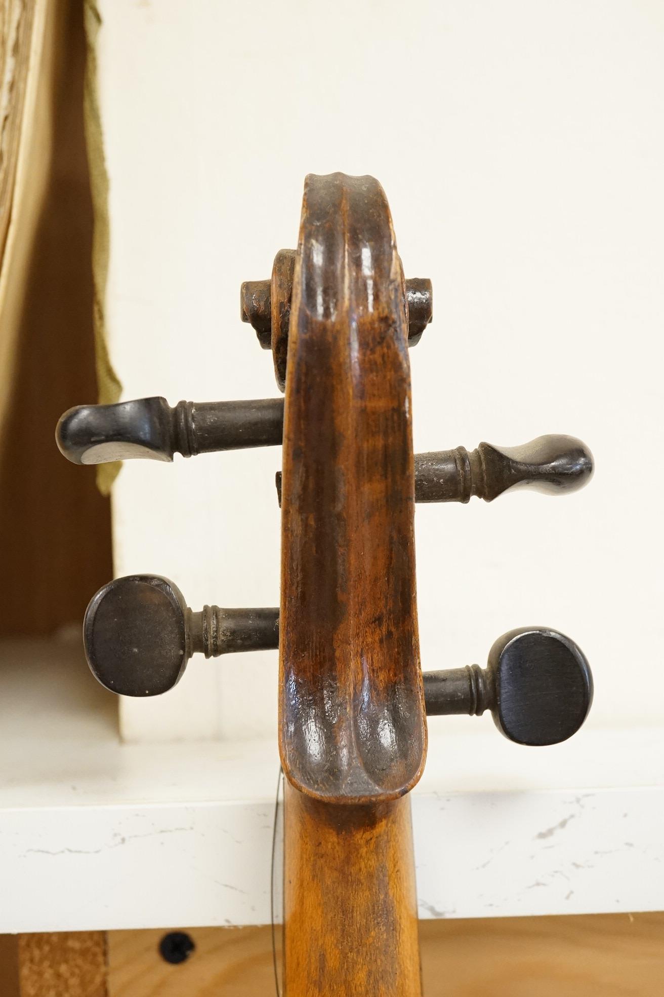 A 19th century violin, and a cased Boosey & Hawkes clarinet